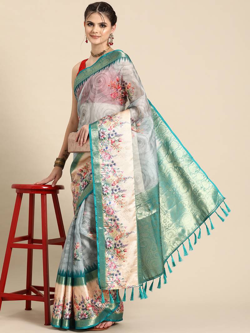 Silk land teal floral faux kanjivaram silk saree with unstitched blouse piece