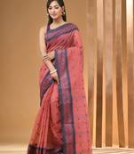 Salmon red pure cotton tant saree with woven designs