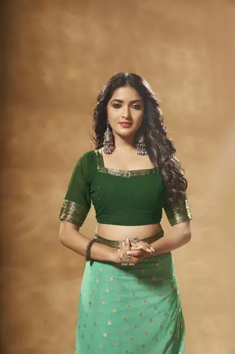 green georgette saree with heavy designer pallu