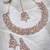 Rose gold plated rainbow stone collar bone necklace set with earring & maangtika jewellery set for women (ns105599)