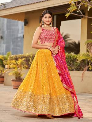 YELLOW PINK SEQUINS THREAD & ZARI EMBROIDERED GEORGETTE DESIGNER WEDDING & PARTY WEAR FESTIVAL SEMI STITCHED LEHENGA 1