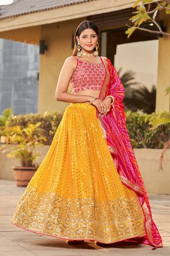 YELLOW PINK SEQUINS THREAD & ZARI EMBROIDERED GEORGETTE DESIGNER WEDDING & PARTY WEAR FESTIVAL SEMI STITCHED LEHENGA