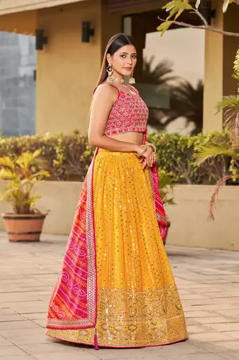 YELLOW PINK SEQUINS THREAD & ZARI EMBROIDERED GEORGETTE DESIGNER WEDDING & PARTY WEAR FESTIVAL SEMI STITCHED LEHENGA