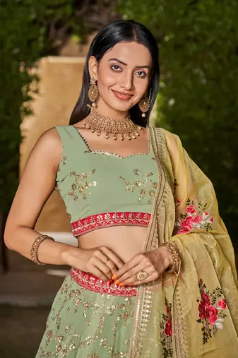 PISTA YELLOW SEQUINS THREAD & ZARI EMBROIDERED GEORGETTE DESIGNER WEDDING & PARTY WEAR FESTIVAL SEMI STITCHED LEHENGA