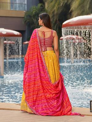 YELLOW PINK SEQUINS THREAD & ZARI EMBROIDERED GEORGETTE DESIGNER WEDDING & PARTY WEAR FESTIVAL SEMI STITCHED LEHENGA 4