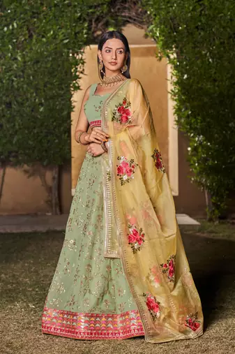 PISTA YELLOW SEQUINS THREAD & ZARI EMBROIDERED GEORGETTE DESIGNER WEDDING & PARTY WEAR FESTIVAL SEMI STITCHED LEHENGA