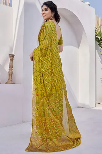 Mustard chiffon foil print/chevron/zig zag print sequinns lace saree with unstitched blouse piece