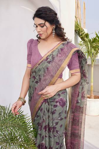 Dusty green kota doria/polyester floral print golden zari border saree with unstitched blouse piece