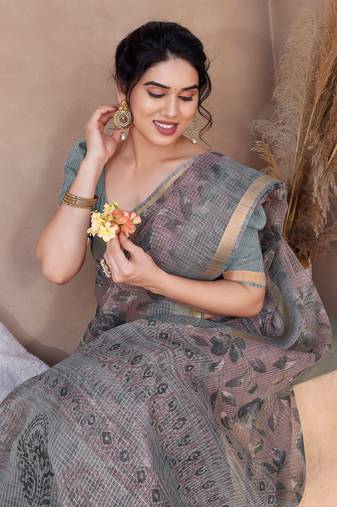 Dusty rose pink kota doria/polyester floral print golden zari border saree with unstitched blouse piece