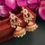 Gold toned kemp jhumka jhumki earrings ruby emerald
