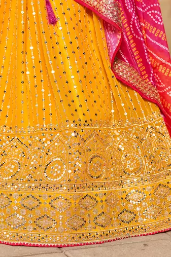 YELLOW PINK SEQUINS THREAD & ZARI EMBROIDERED GEORGETTE DESIGNER WEDDING & PARTY WEAR FESTIVAL SEMI STITCHED LEHENGA