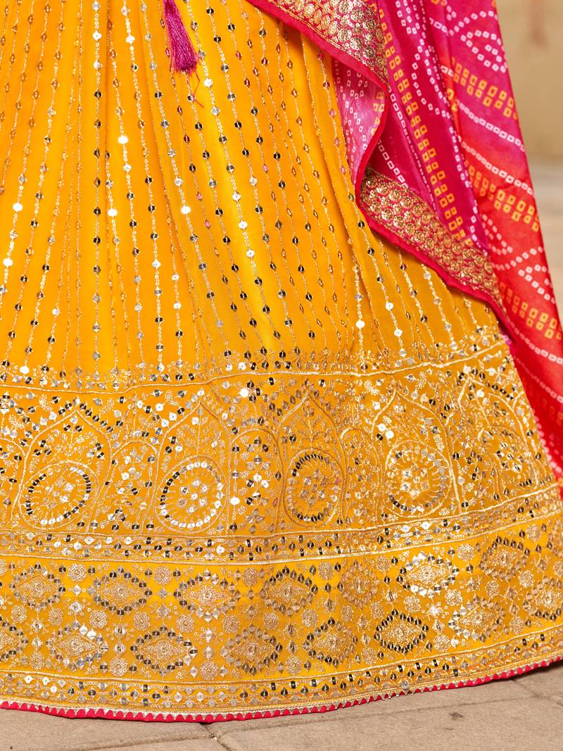 YELLOW PINK SEQUINS THREAD & ZARI EMBROIDERED GEORGETTE DESIGNER WEDDING & PARTY WEAR FESTIVAL SEMI STITCHED LEHENGA