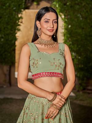 PISTA YELLOW SEQUINS THREAD & ZARI EMBROIDERED GEORGETTE DESIGNER WEDDING & PARTY WEAR FESTIVAL SEMI STITCHED LEHENGA 8