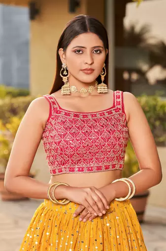 YELLOW PINK SEQUINS THREAD & ZARI EMBROIDERED GEORGETTE DESIGNER WEDDING & PARTY WEAR FESTIVAL SEMI STITCHED LEHENGA