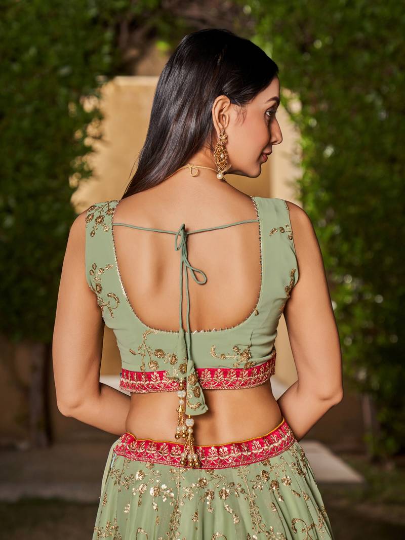 PISTA YELLOW SEQUINS THREAD & ZARI EMBROIDERED GEORGETTE DESIGNER WEDDING & PARTY WEAR FESTIVAL SEMI STITCHED LEHENGA