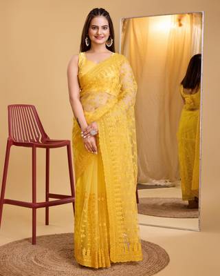Yellow soft net sarree with plain blouse piece 1