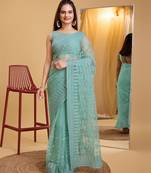 Blue  soft net sarree with plain blouse piece