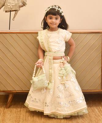 Off white thread and gota embroidery lehenga choli with green frll 1