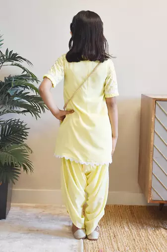 Yellow net sequence dhoti set