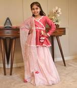 Pink peplum top with lehenga