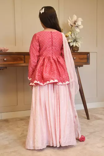 Pink peplum top with lehenga