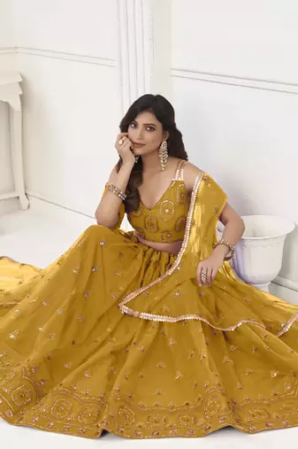 MUSTARD YELLOW NET FABRIC LEHENGA CHOLI WITH SEQUINS AND THREAD EMBROIDERY WORK