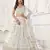 OFF WHITE NET FABRIC LEHENGA CHOLI WITH SEQUINS AND THREAD EMBROIDERY WORK
