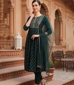 women green silk blend solid woven design flared empire kurta pant with dupatta