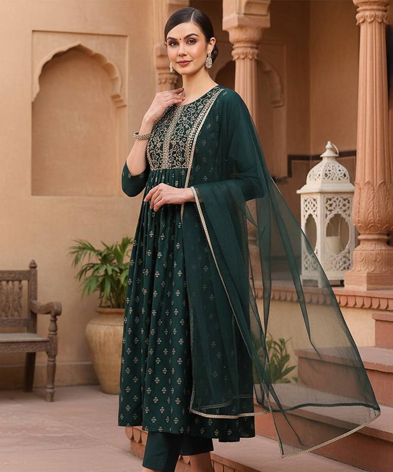 women green silk blend solid woven design flared empire kurta pant with dupatta