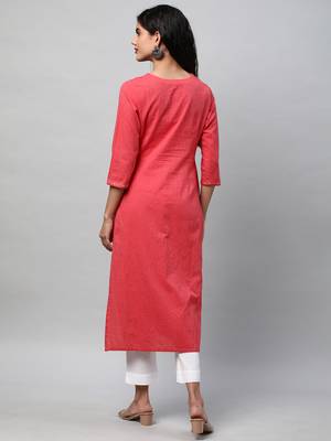A straight kurta with machine embroidery at the center and sleeve. 2