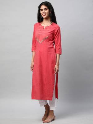A straight kurta with machine embroidery at the center and sleeve. 4