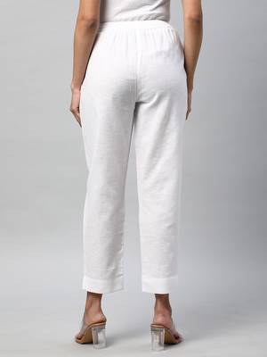 A fully elasticated white ankle length cotton linen pant. 2