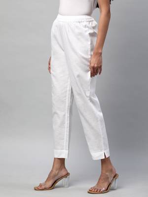 A fully elasticated white ankle length cotton linen pant. 3