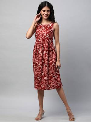 Boxy flared printed cotton dress with hand embroidery. 1