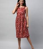 Boxy flared printed cotton dress with hand embroidery.