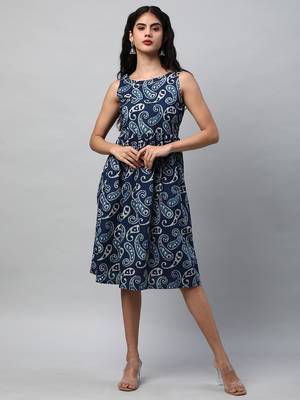 Boxy flared printed cotton dress with hand embroidery. 1