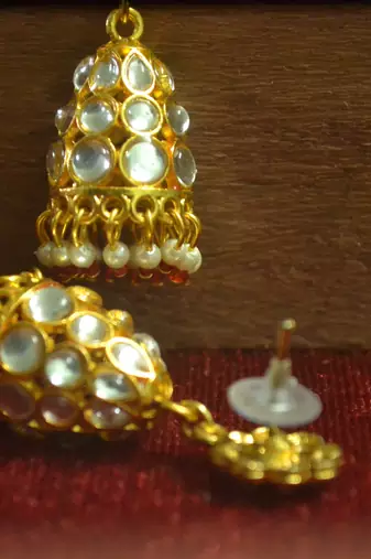 Designer kundan stone gold plated jhumka stud earrings for women