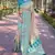 Chickoo Pure Tissue Zari Woven Saree