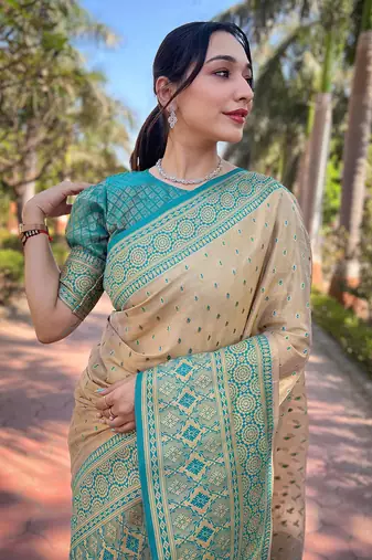Chickoo Pure Tissue Zari Woven Saree