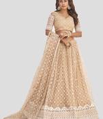  beige thread embroidery net lehenga set choli with dupatta