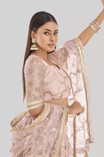 Prominent Pastel Pink Sequins Embroidery Net Lehenga Choli