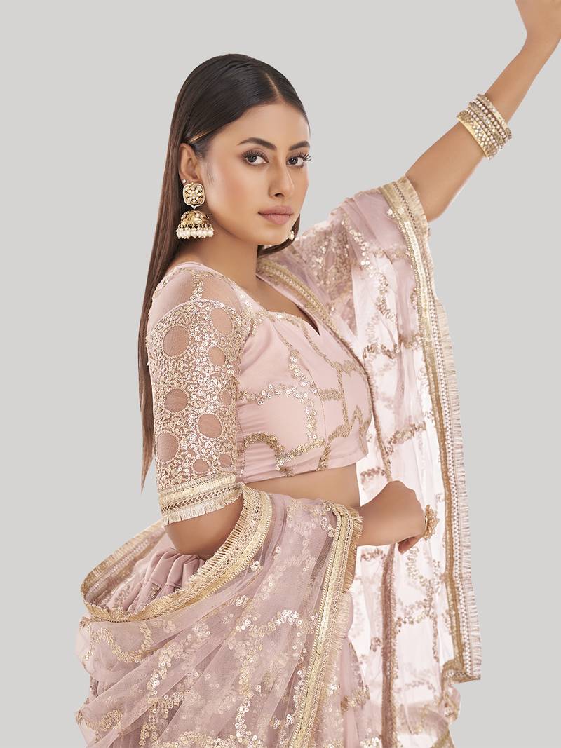 Prominent Pastel Pink Sequins Embroidery Net Lehenga Choli