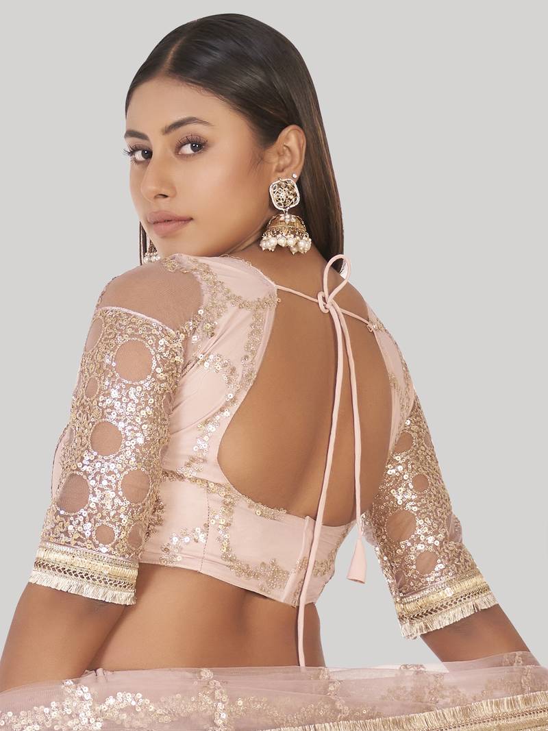 Prominent Pastel Pink Sequins Embroidery Net Lehenga Choli