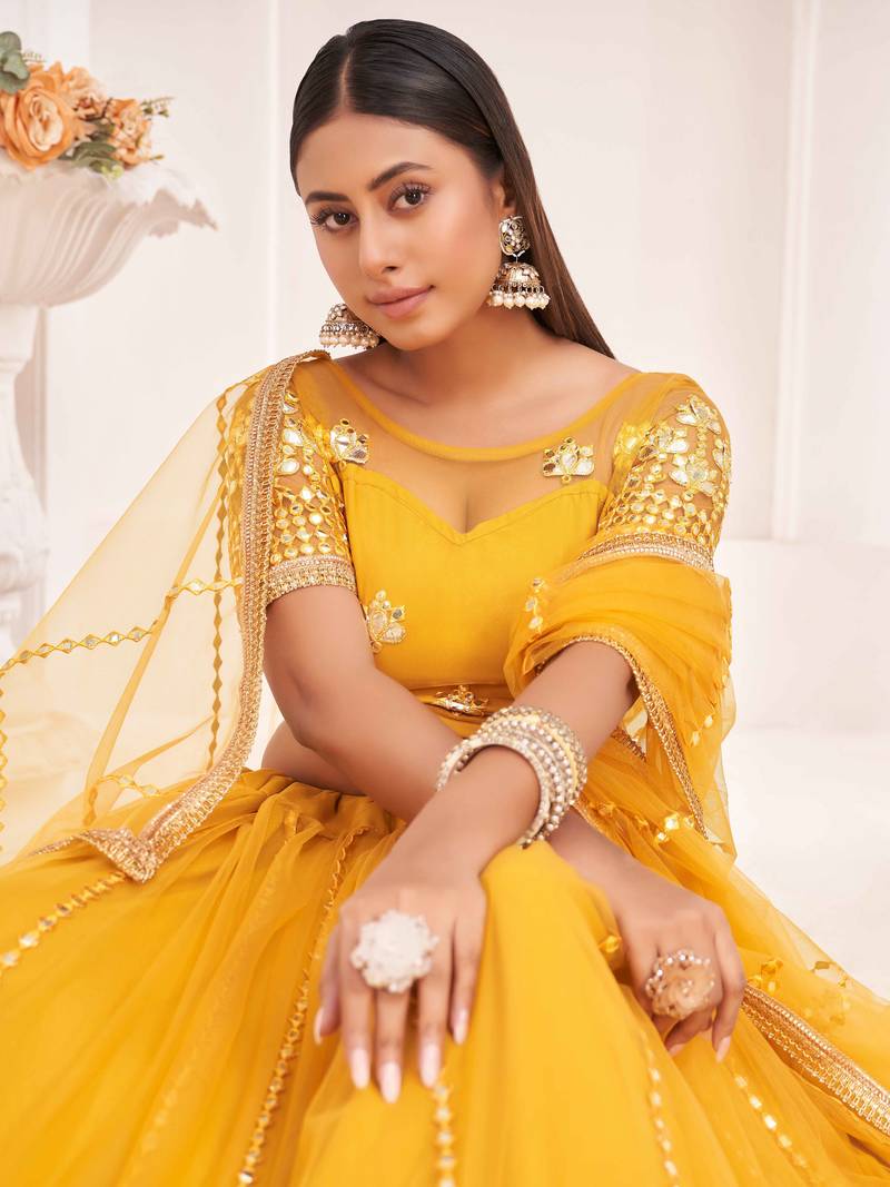Graceful Mustard Yellow Thread Embroidery Net Lehenga Choli