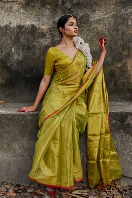 Solid neon green handloom tissue saree with red border 1