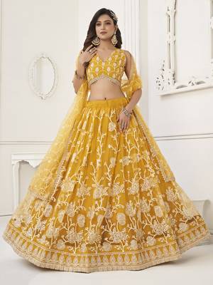 appealing mustard yellow embroidered net haldi lehenga set choli with dupatta 1
