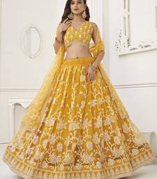 appealing mustard yellow embroidered net haldi lehenga set choli with dupatta