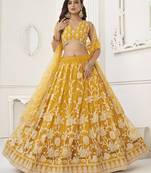 Appealing Mustard Yellow Embroidered Net Haldi Wear Lehenga Choli