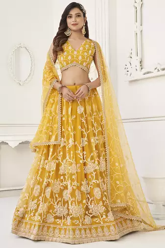 appealing mustard yellow embroidered net haldi lehenga set choli with dupatta