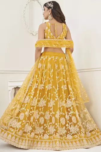 appealing mustard yellow embroidered net haldi lehenga set choli with dupatta